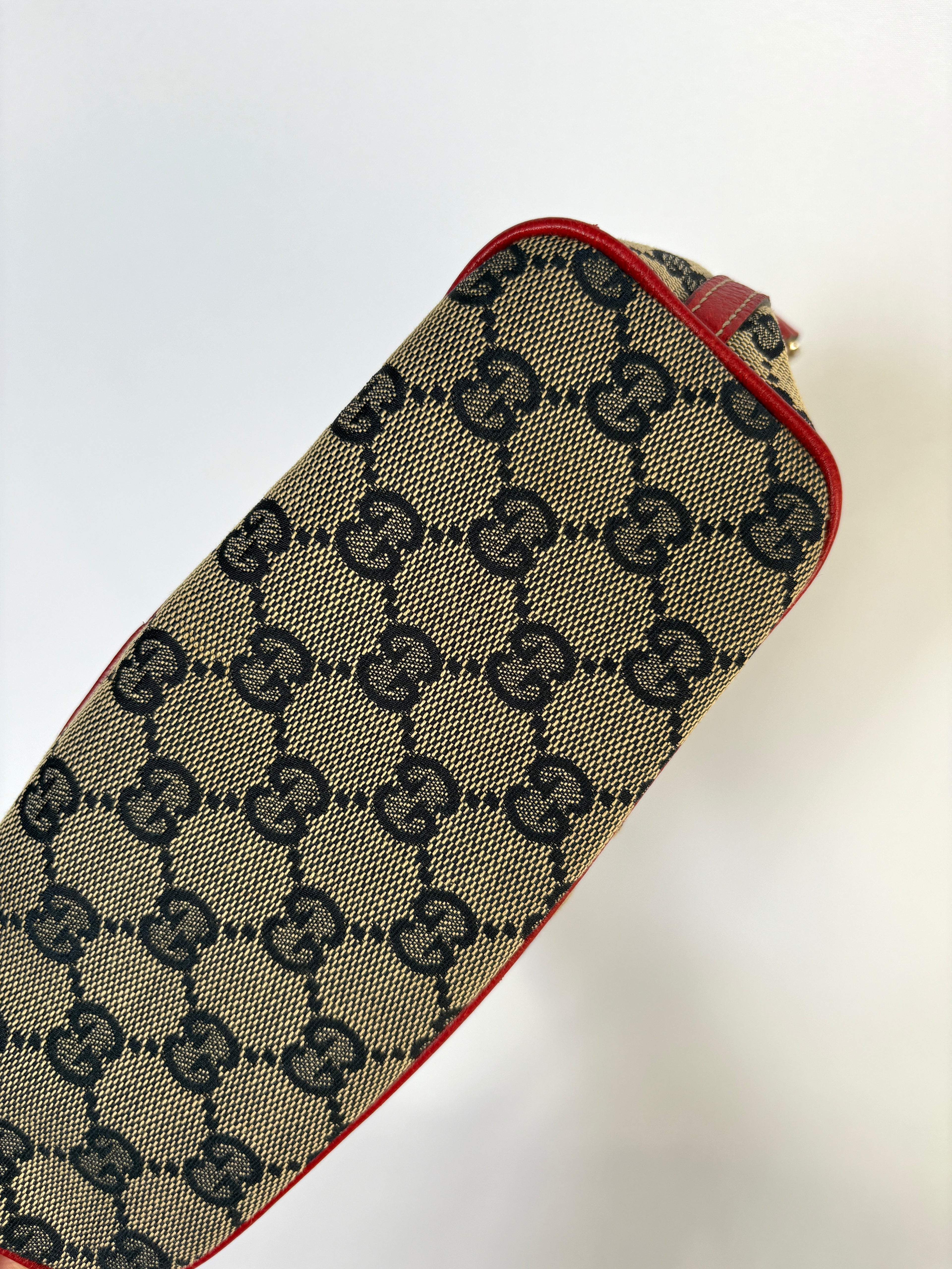 Gucci Pochette Boat Bag navy blauw rood GG canvas onderzijde