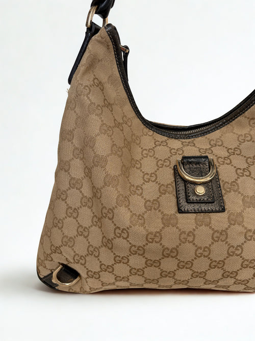 Gucci Abbey D-Ring Canvas Hobo - Vooraanzicht Links - Trésor de Lou