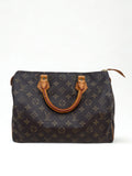 Vintage Louis Vuitton Monogram Speedy 30, vooraanzicht. Gouden hardware, vachetta leer.