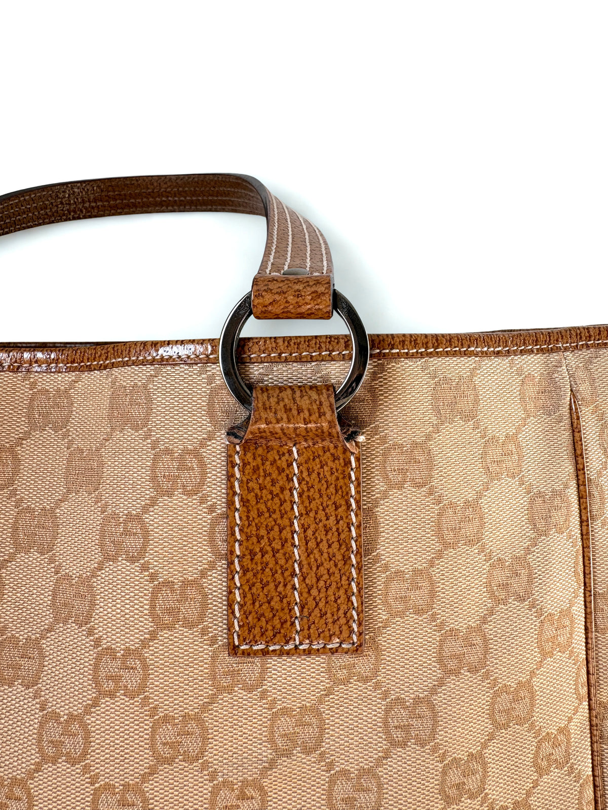 Pre-loved Gucci GG Monogram Tote voorzijde, zilveren hardware 
