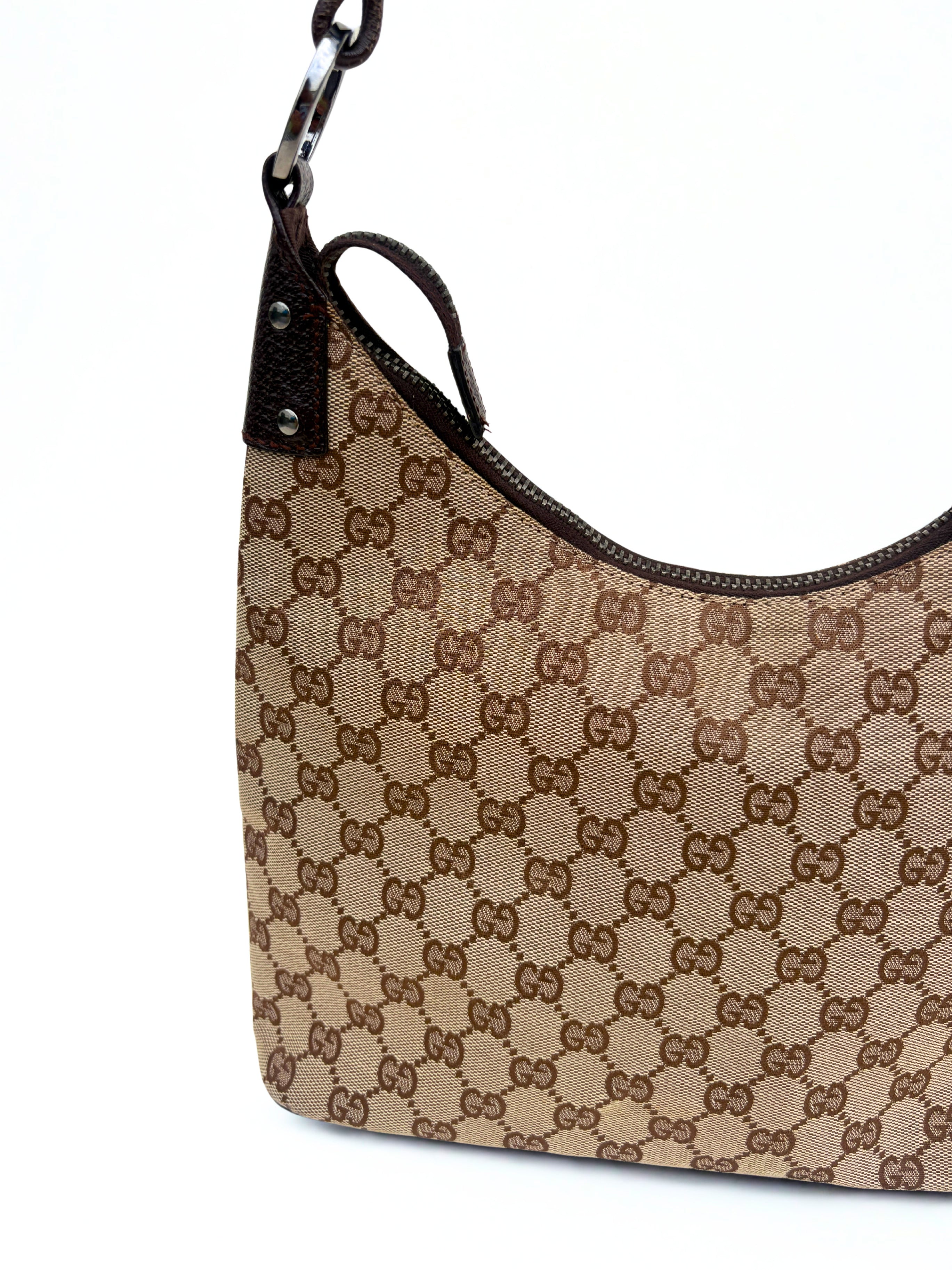 intage Gucci Monogram Canvas Lock tas , zijaanzicht, GG canvas met donkerbruin leer