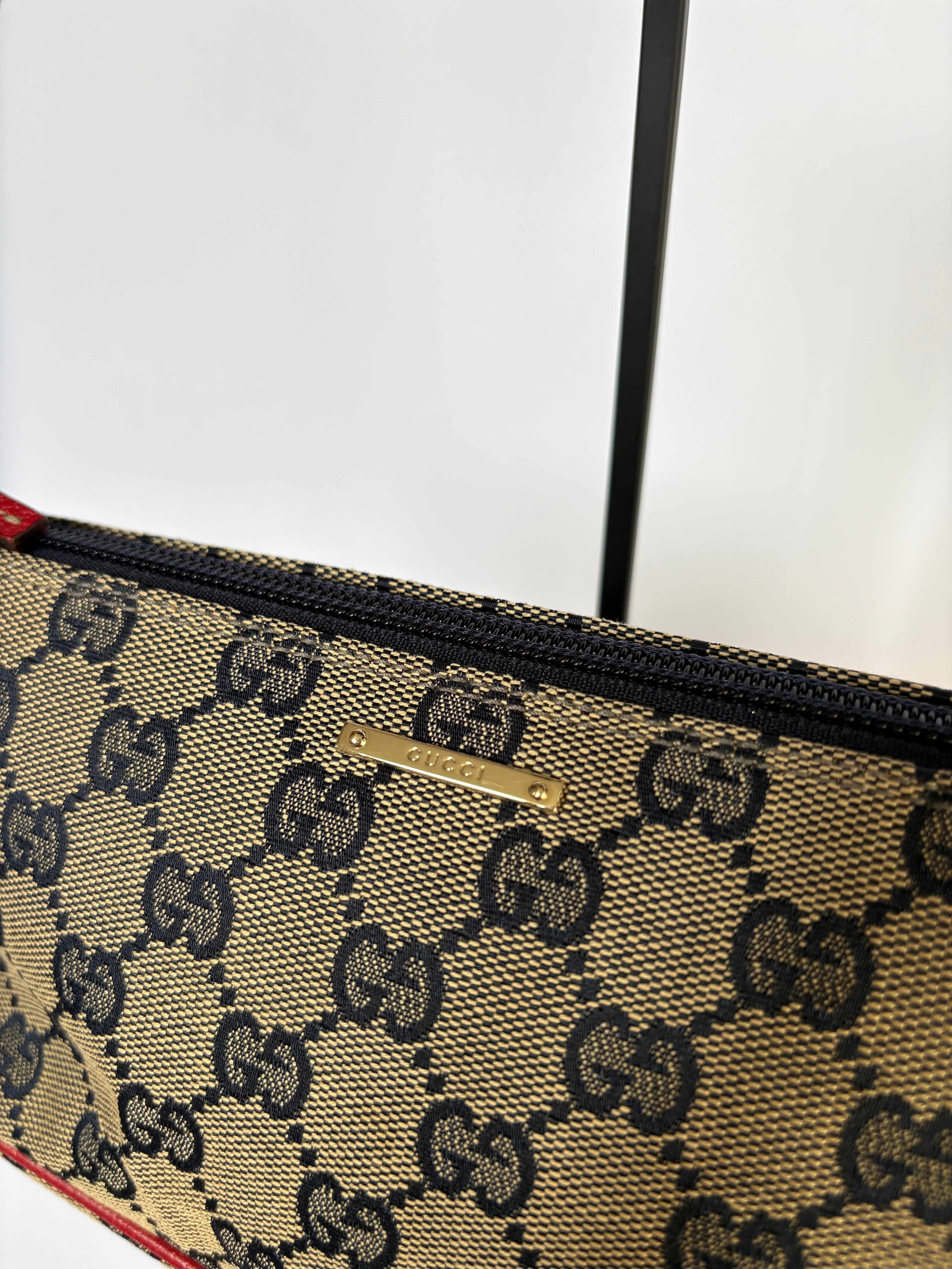 Gucci Pochette Boat Bag navy blauw rood GG canvas gouden hardware