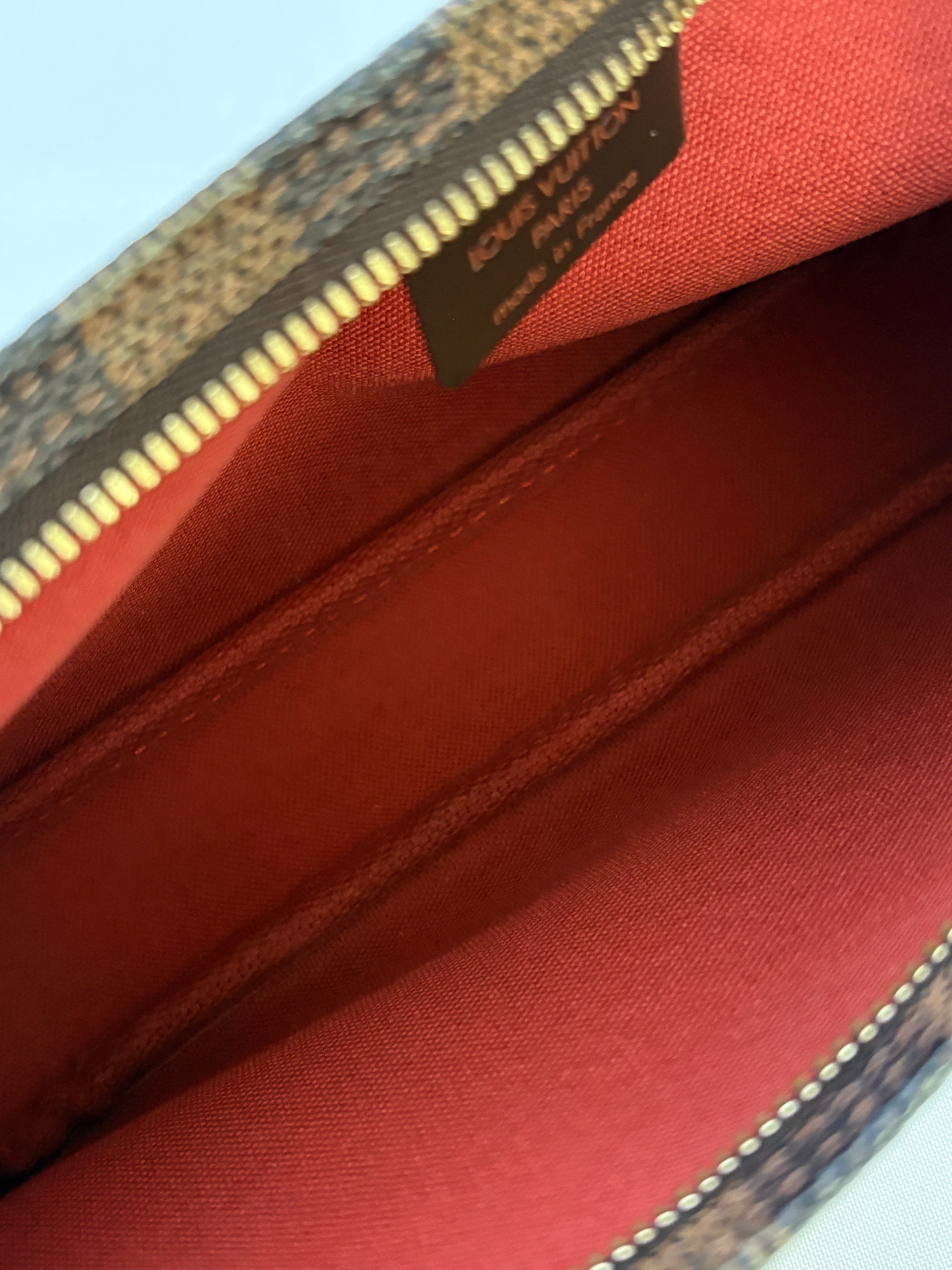 Louis Vuitton Navona pochette damier ebene binnenzijde