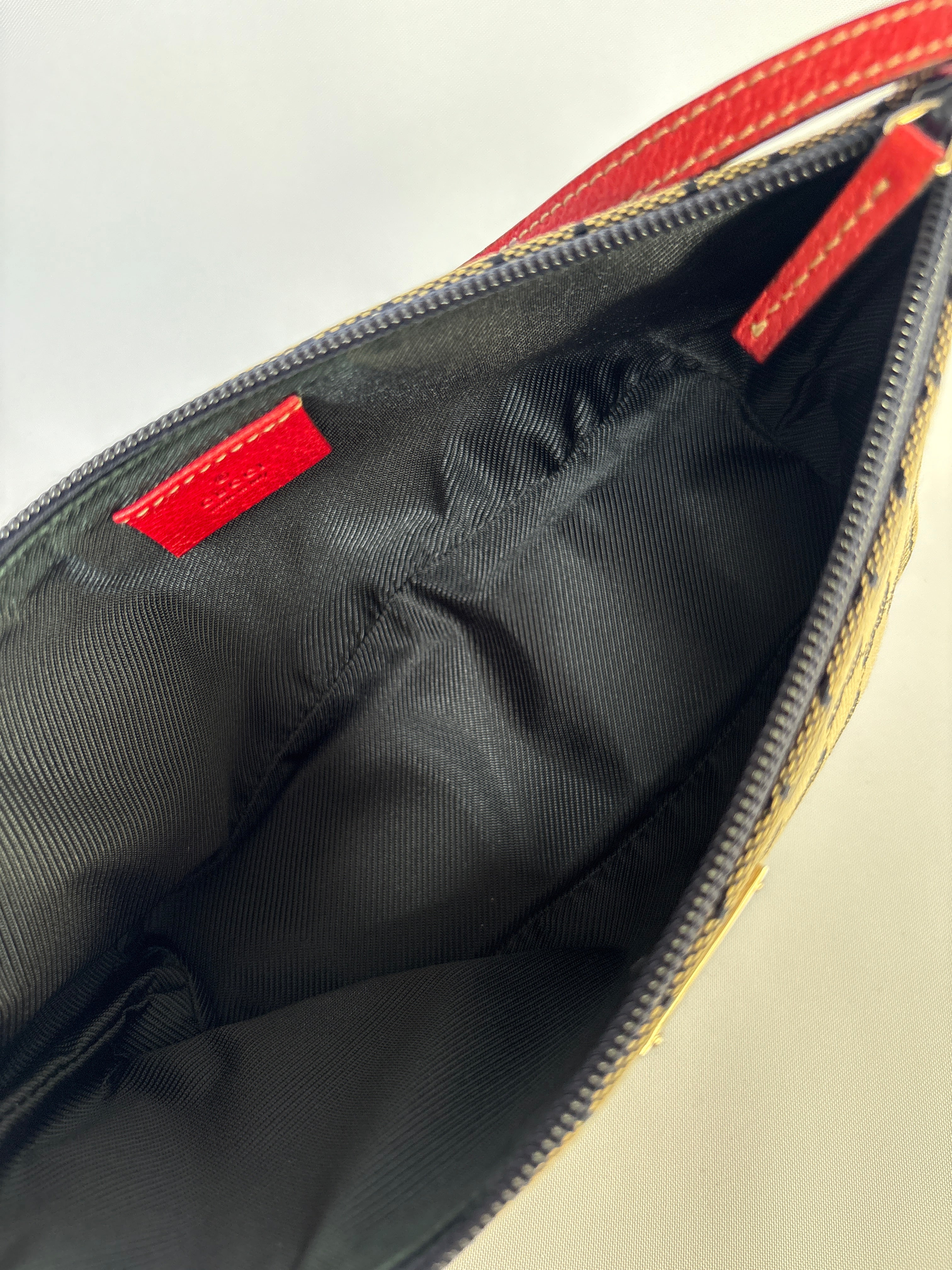 Gucci Pochette Boat Bag navy blauw rood GG canvas binnenzijde schoon