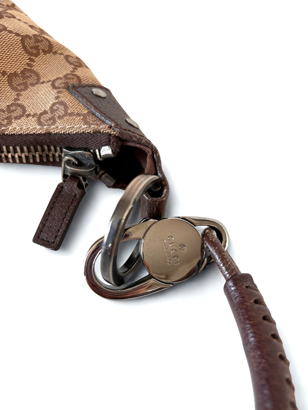 Pre-loved Gucci GG Monogram canvas hobo lock met zilveren hardware