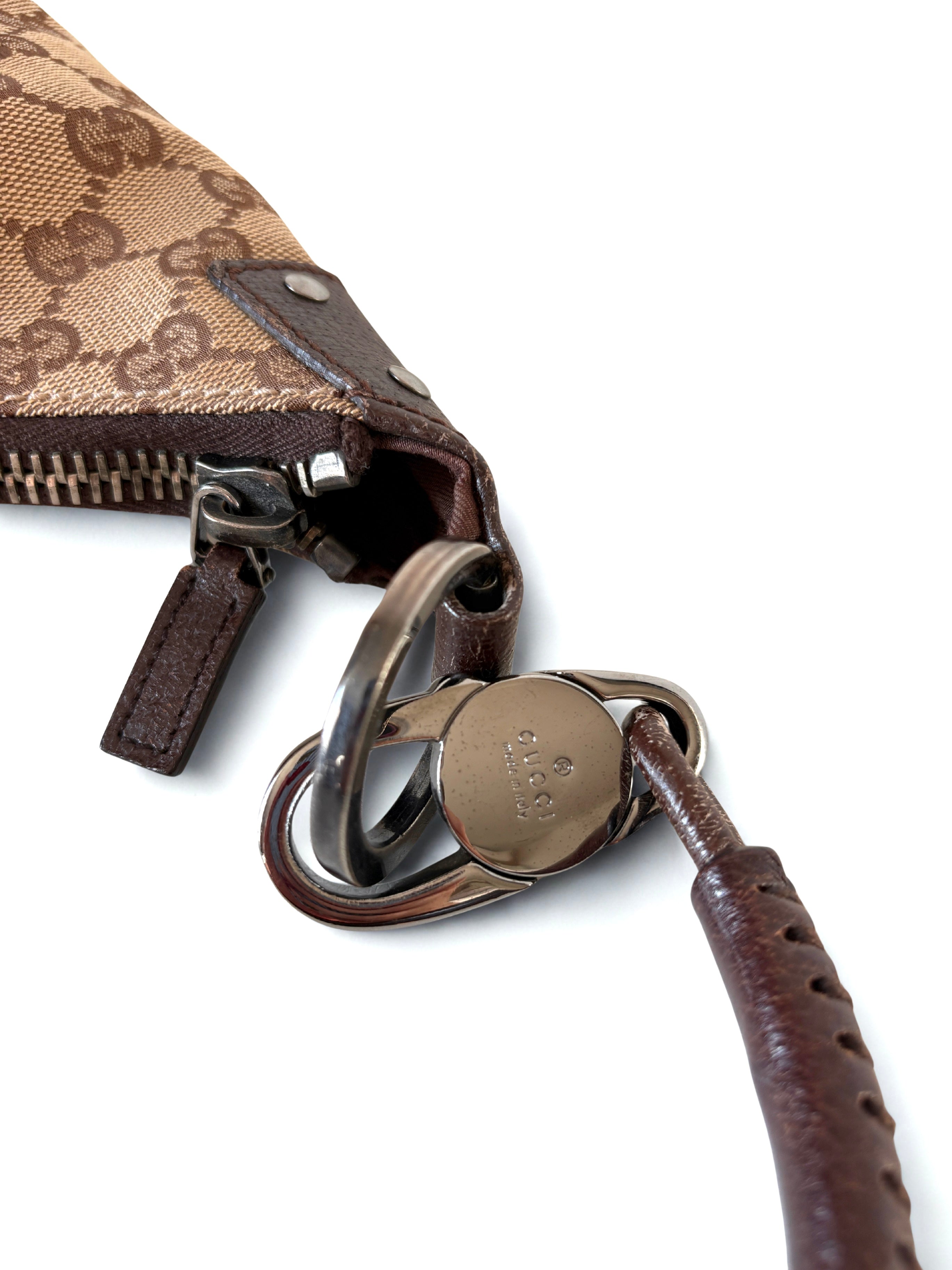 Pre-loved Gucci GG Monogram canvas hobo lock met zilveren hardware