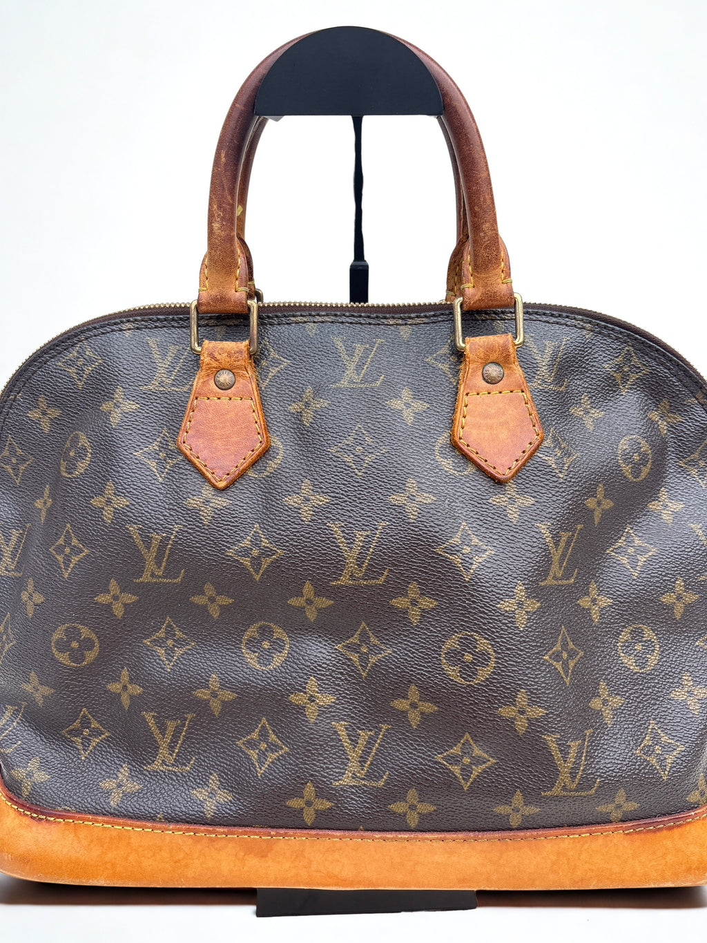 Vintage Louis Vuitton Alma Old tas, iconisch monogram canvas met gouden hardware. Pre-loved tas