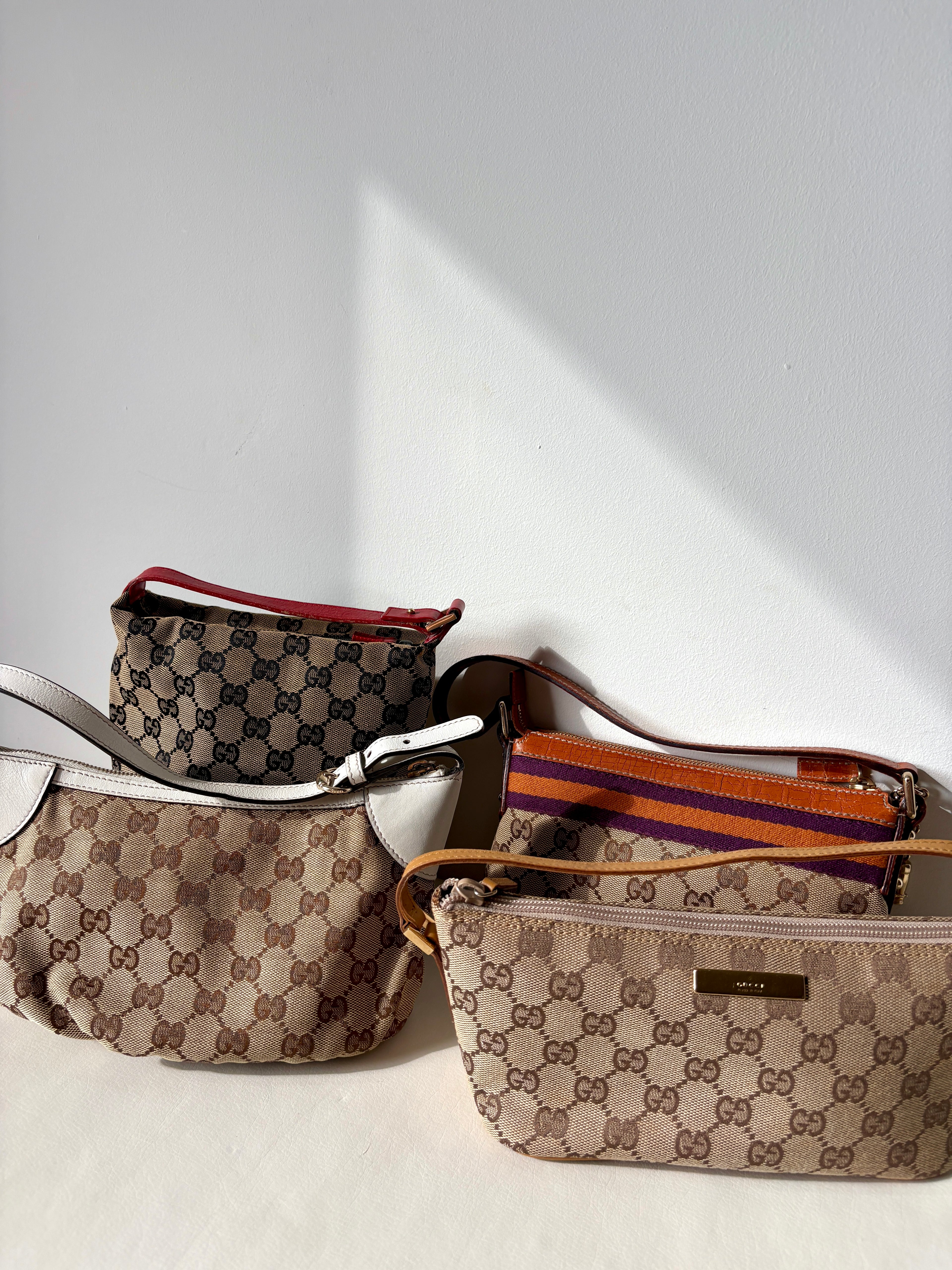 Gucci GG Canvas Pochette Boat