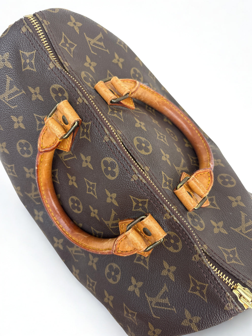 Vintage Louis Vuitton Monogram Speedy 30 tas. Bovenaanzicht gouden rits/hardware.