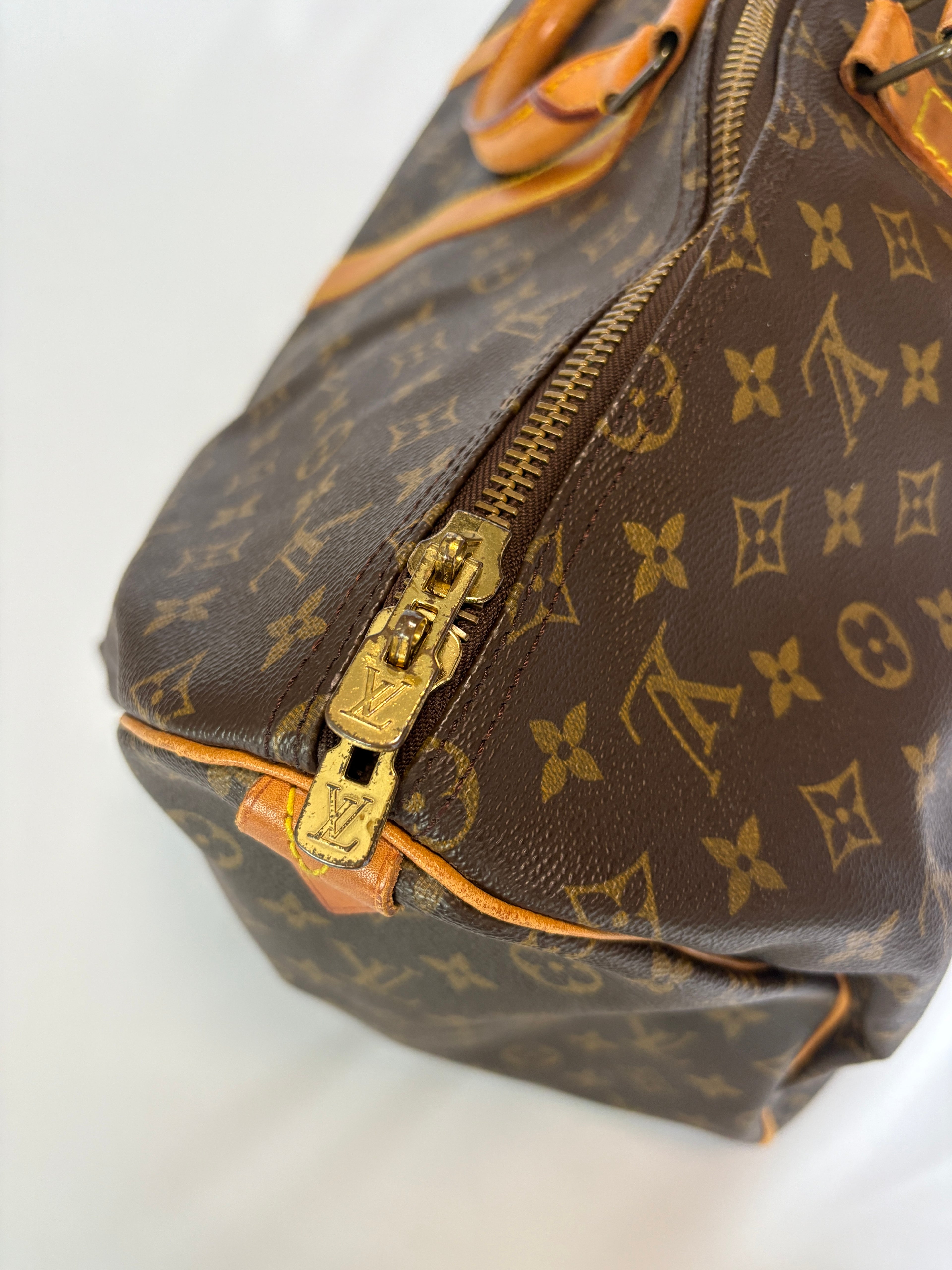 Louis Vuitton Keepall 55 monogram gouden hardware